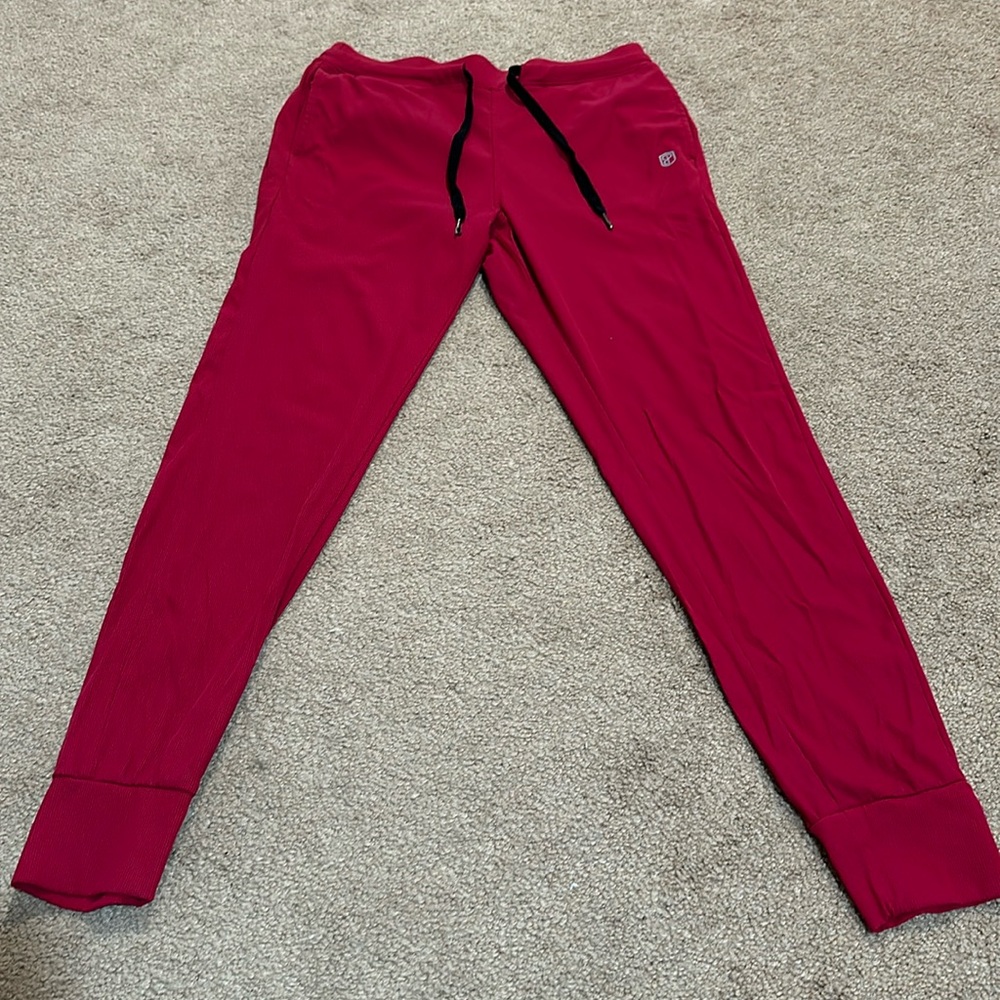 Women’s red Born Primitive joggers. Size XS.
